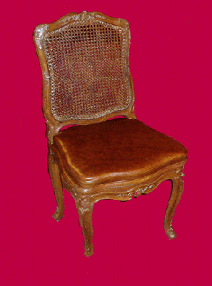 Coussin  gainé de cuir confectionné par un tapissier décorateur au Vésinet 78, 75 et 92